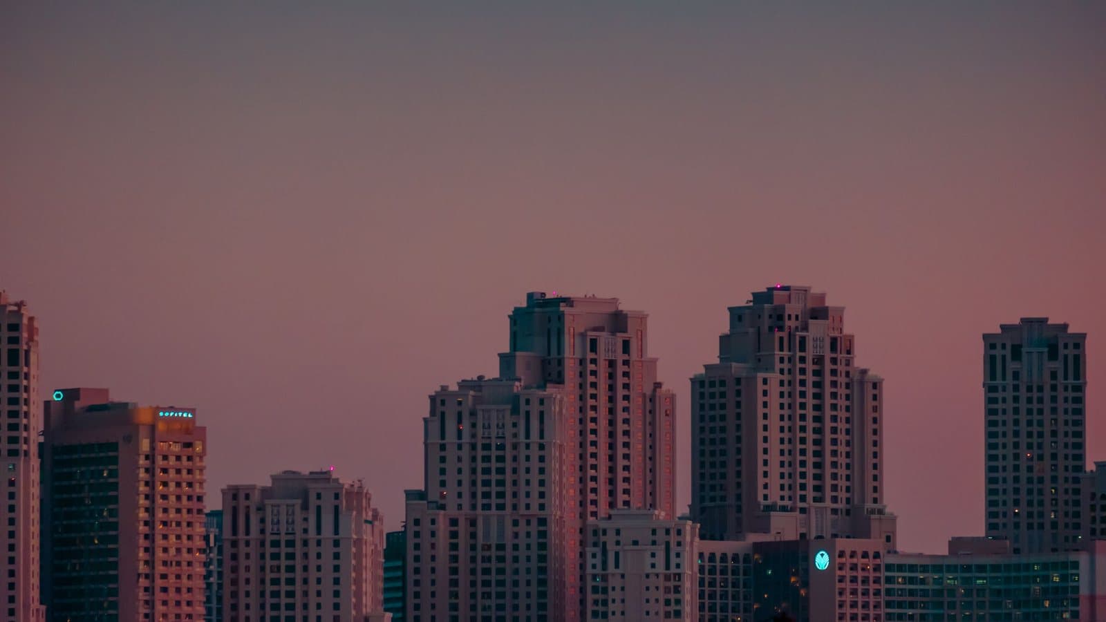 Dubai residential towers at dusk