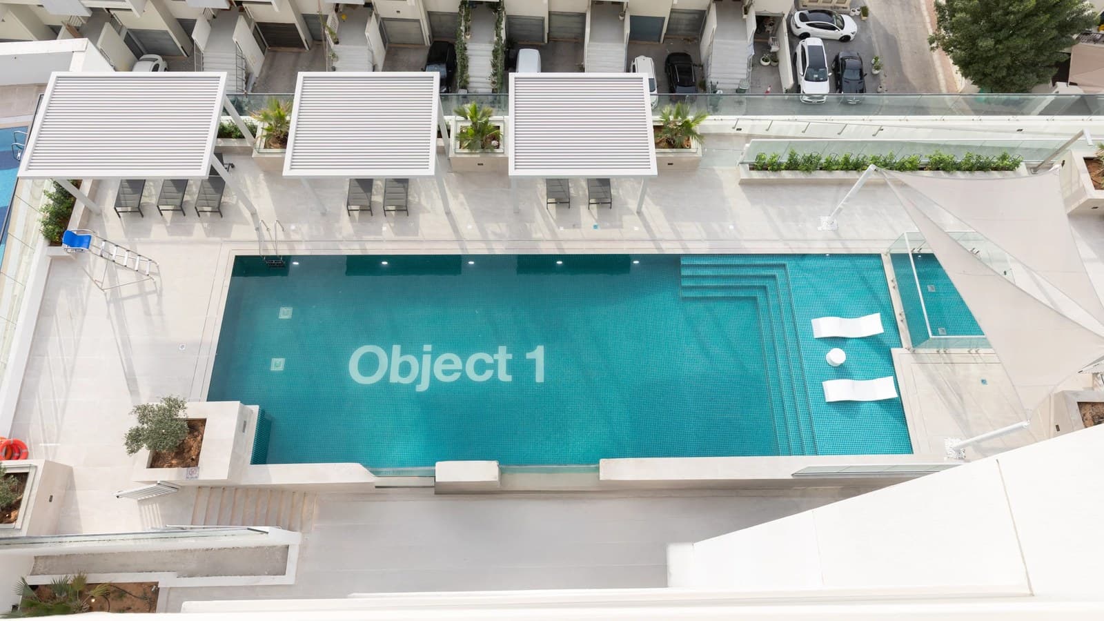 RA1N residential building and pool terrace in Jumeirah Village Circle, with Object 1 branding in the pool
